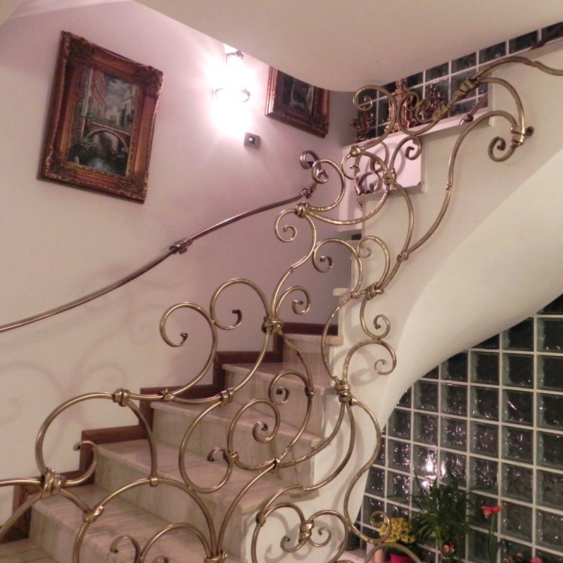 Forged metal interior railing — organic composition